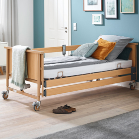 Pflegebett Standard mit Holzseitengitter und Aufrichter
