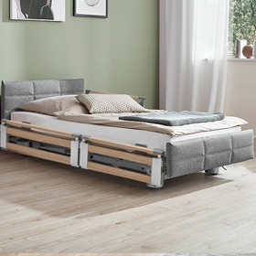 Pflegebett Regia - Bezug gesteppt, geteilte Seitenteile, Dekor Havanna